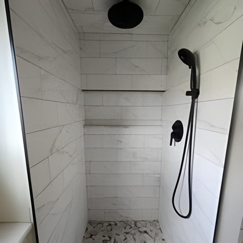 Modern marble tile shower with rainfall and handheld showerheads
