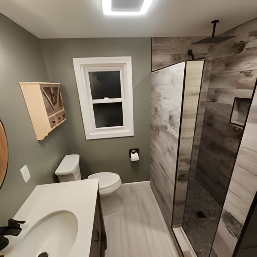 Modern bathroom remodel with tile shower and vanity