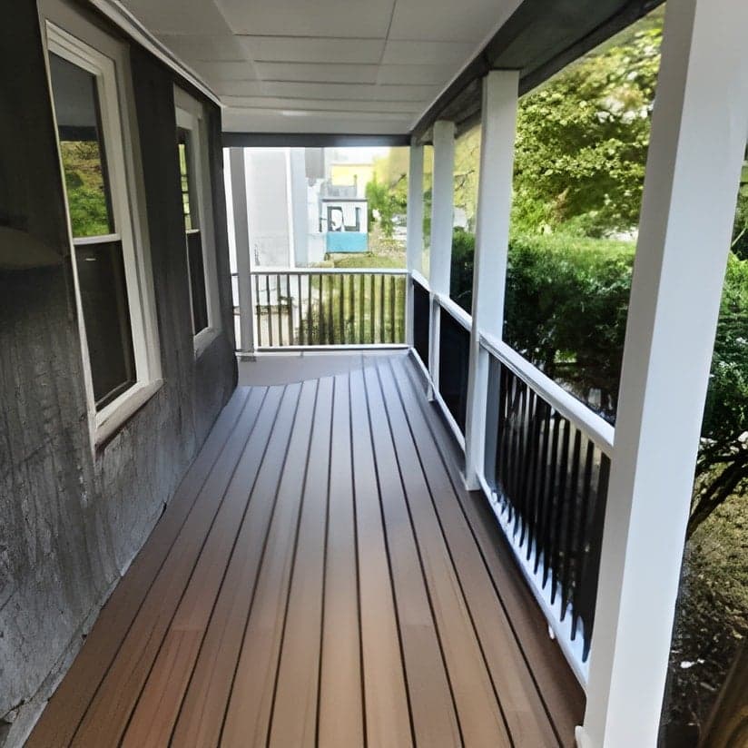 Finished composite deck with white railings and columns